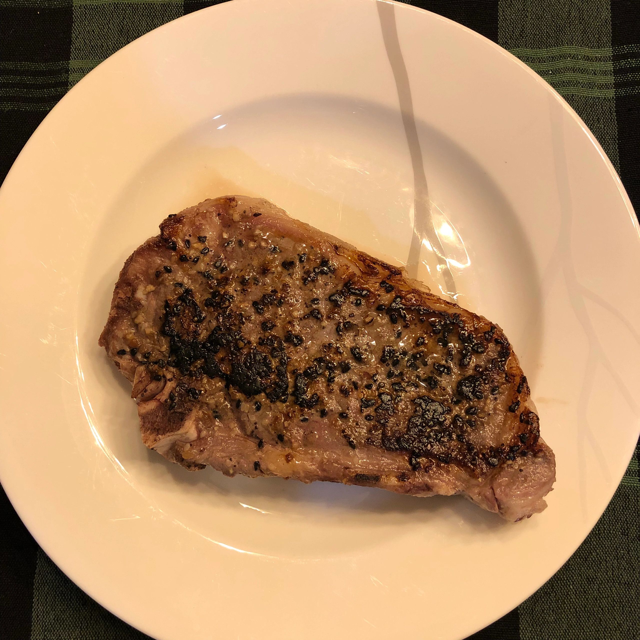 Strip steak plated for dinner