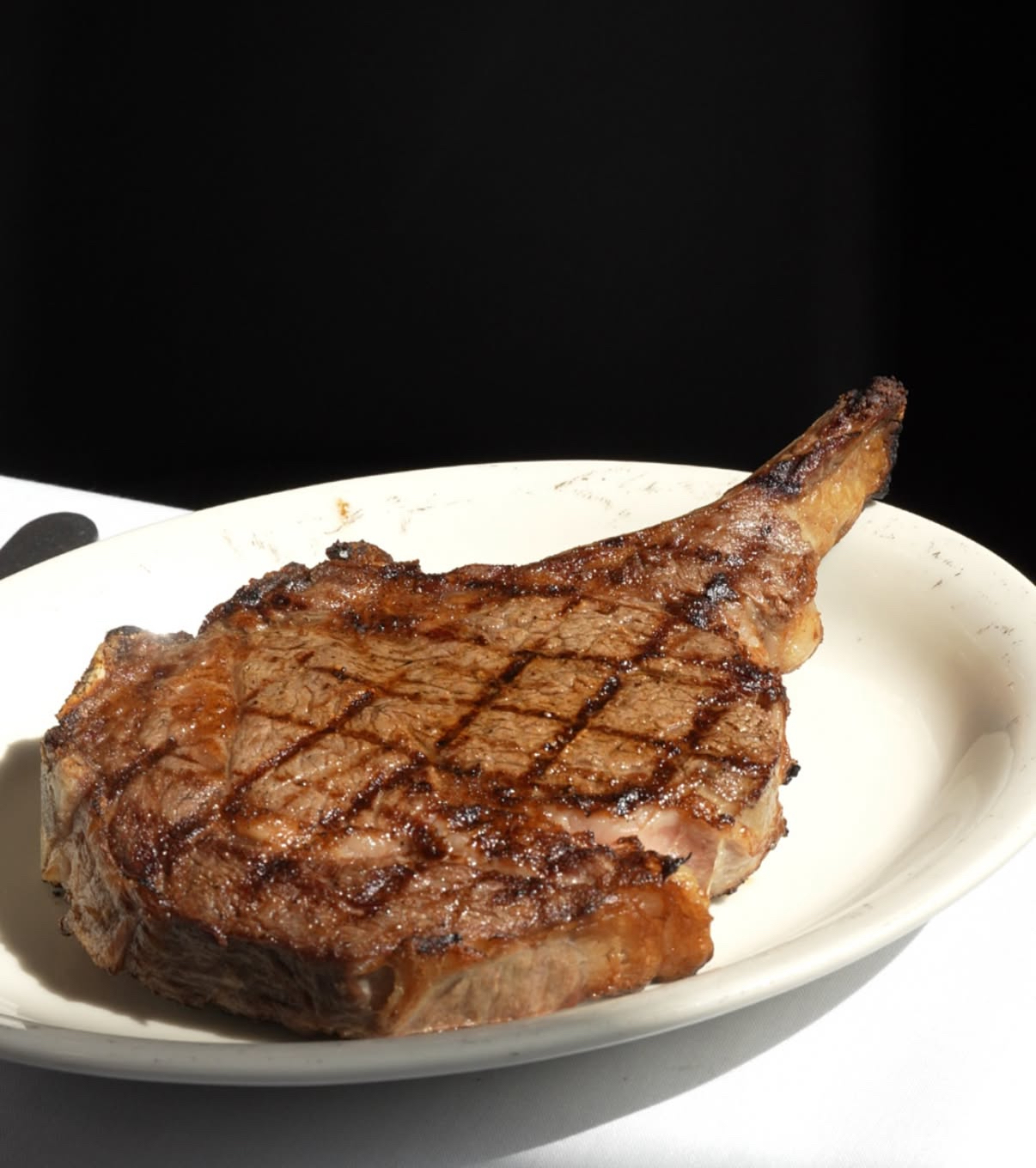 Ribeye steak plated for service